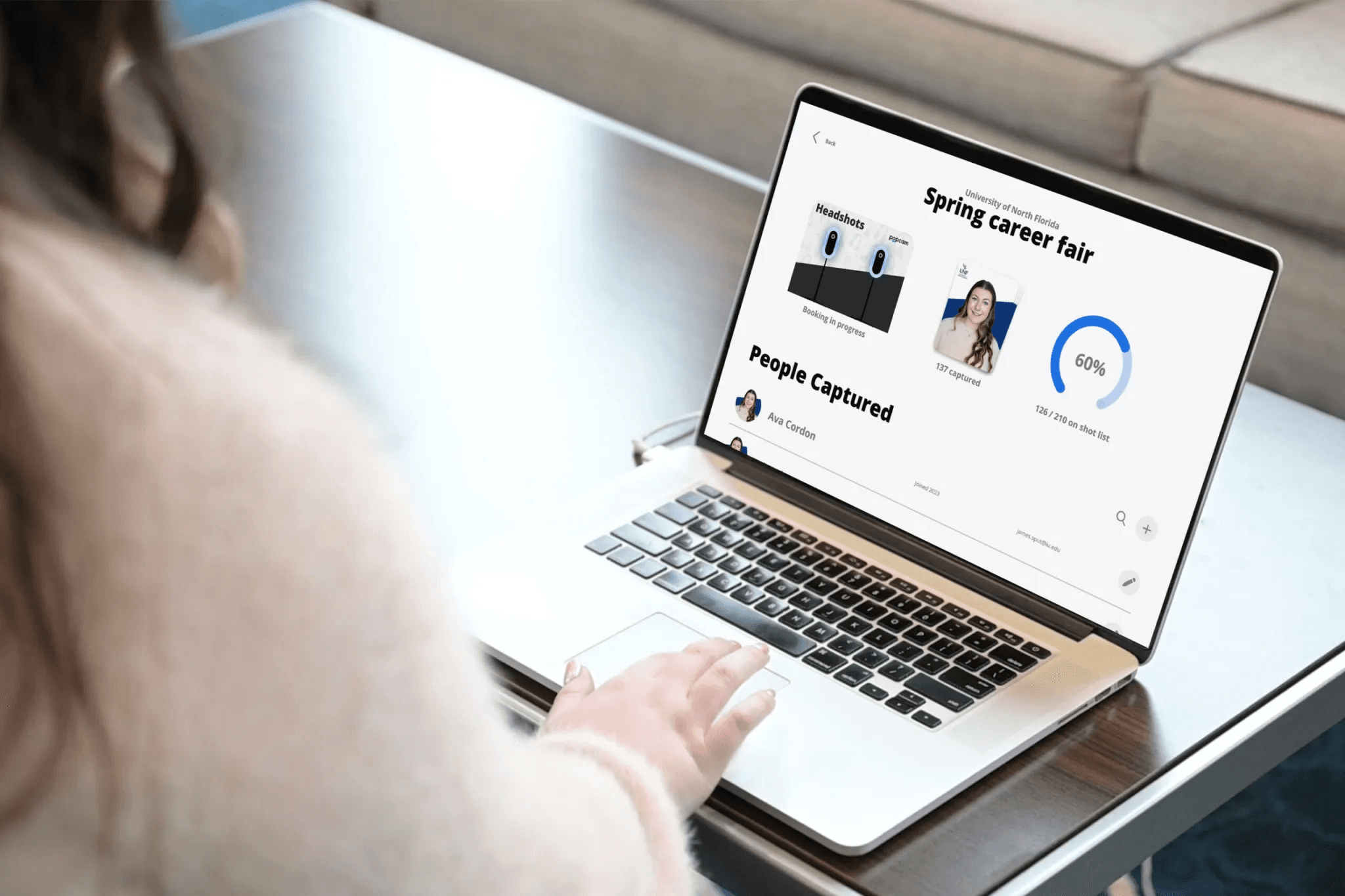 A laptop showing Popcam usage reporting after an event